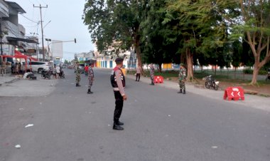Hari-Terakhir-Operasi,-Anggota-Pos-Pam-Monumen-Tsunami-melakukan-Pengaturan-Arus-Lalu-Lintas